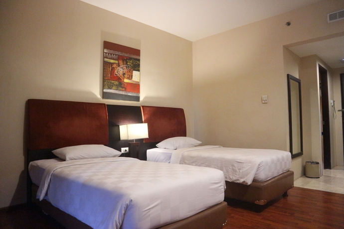 Imagen de la habitación del Hotel Grand Anugerah. Foto 10