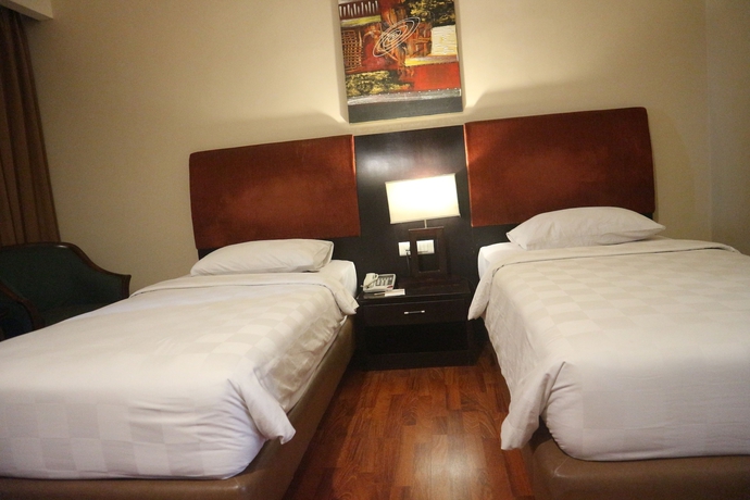 Imagen de la habitación del Hotel Grand Anugerah. Foto 12