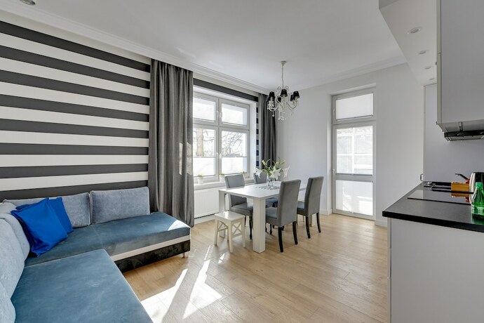 Imagen de la habitación del Hotel Grand Apartments. Foto 14