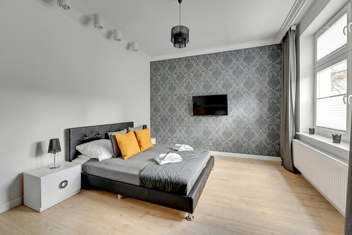 Imagen de la habitación del Hotel Grand Apartments. Foto 16
