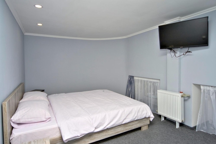 Imagen de la habitación del Hotel Grand Apartments, Kiev. Foto 19