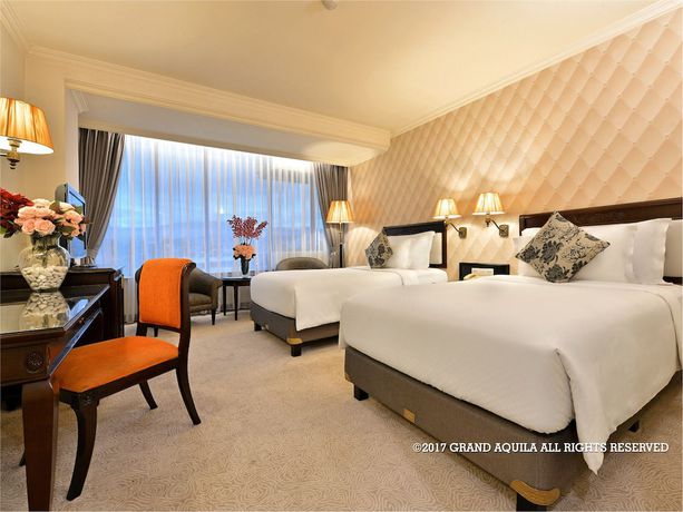 Imagen de la habitación del Hotel Grand Aquila Bandung. Foto 6