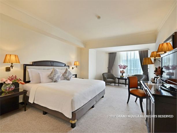 Imagen de la habitación del Hotel Grand Aquila Bandung. Foto 12