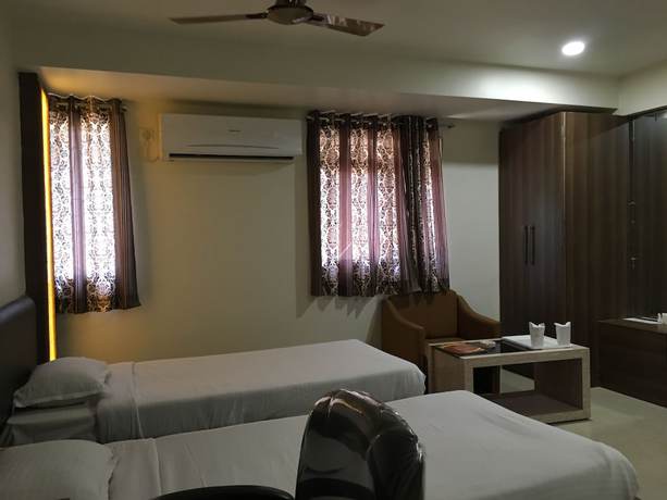 Imagen de la habitación del Hotel Grand Arjun, Raipur. Foto 2