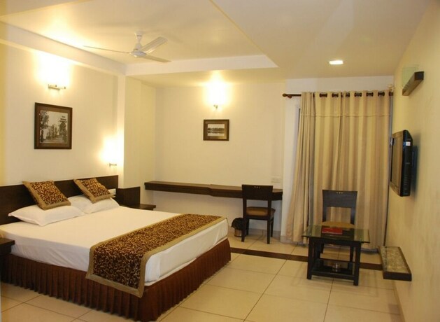 Imagen de la habitación del Hotel Grand Ashirwad Beacon. Foto 17