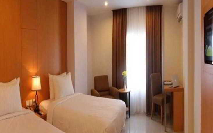 Imagen de la habitación del Hotel Grand Asia. Foto 5
