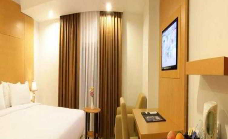 Imagen de la habitación del Hotel Grand Asia. Foto 9