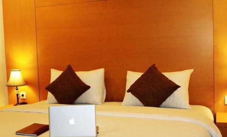 Imagen de la habitación del Hotel Grand Asia. Foto 10