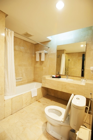 Imagen de la habitación del Hotel Grand Asia, Yakarta Utara. Foto 3
