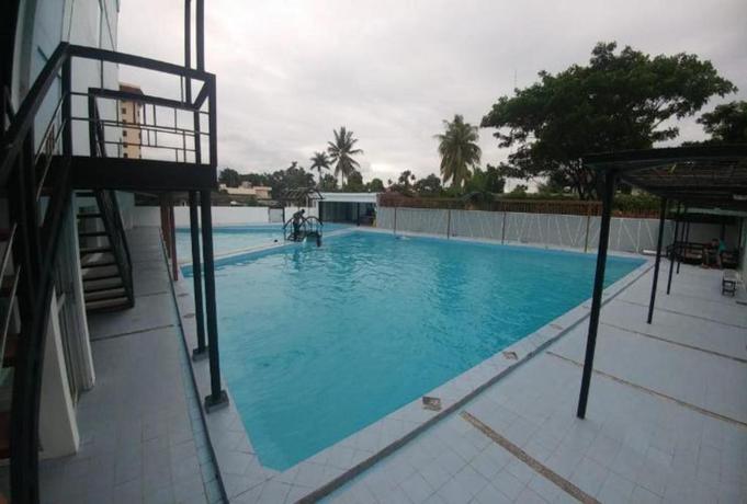 Imagen de la piscina del Hotel Grand Asrilia Hotel Convention and Restaurant. Foto 12