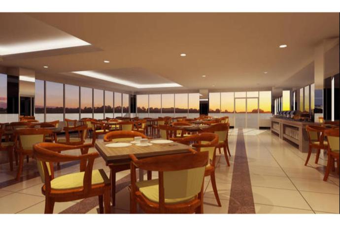 Imagen del bar/restaurante del Hotel Grand Asrilia Hotel Convention and Restaurant. Foto 2