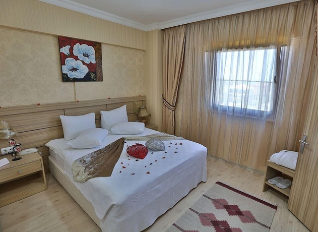 Imagen de la habitación del Hotel Grand Ayzek Otel. Foto 7