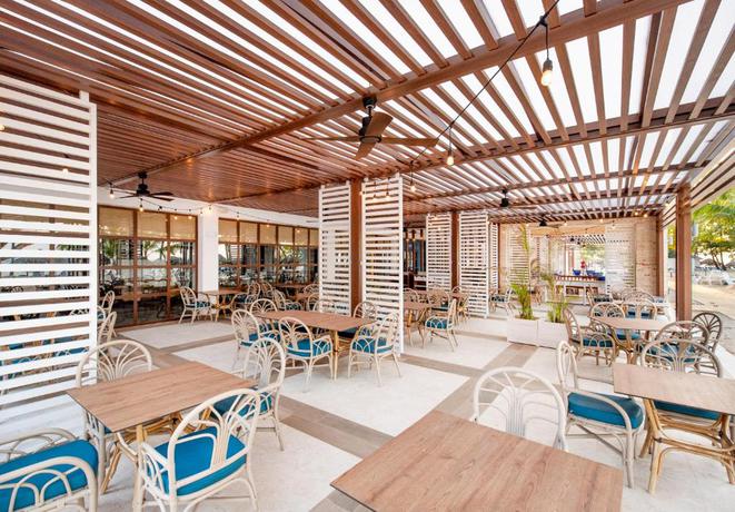 Imagen del bar/restaurante del Hotel Grand Bahia Principe El Portillo. Foto 11