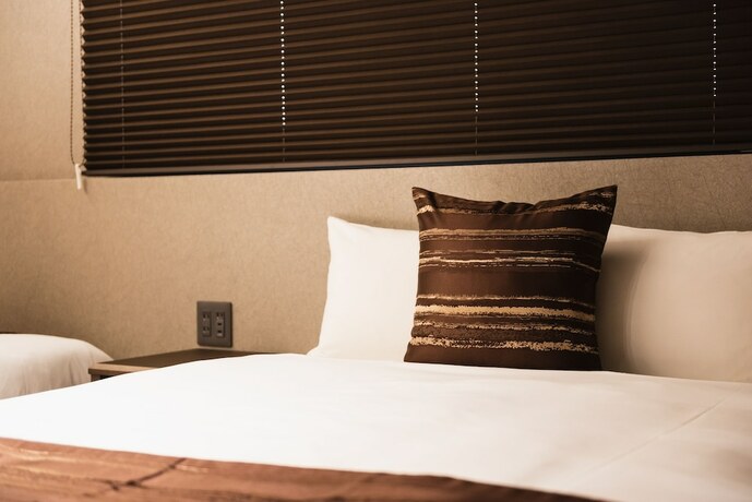 Imagen de la habitación del Hotel Grand Base Beppu Ekihigashi. Foto 18
