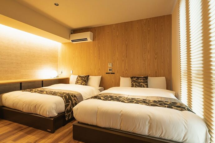 Imagen de la habitación del Hotel Grand Base Iolani. Foto 16