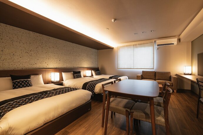 Imagen de la habitación del Hotel Grand Base Iolani. Foto 17