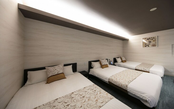 Imagen de la habitación del Hotel Grand Base Takamatsu. Foto 20