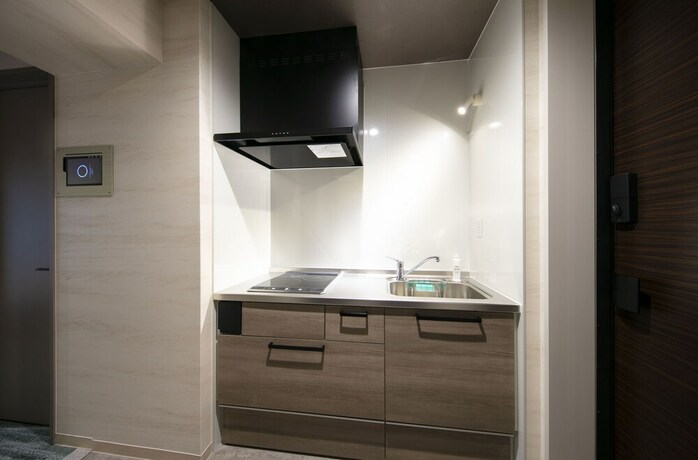 Imagen de la habitación del Hotel Grand Base Takamatsu. Foto 24