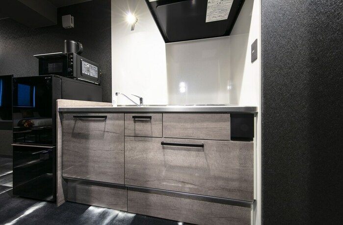 Imagen de la habitación del Hotel Grand Base Takamatsu. Foto 27