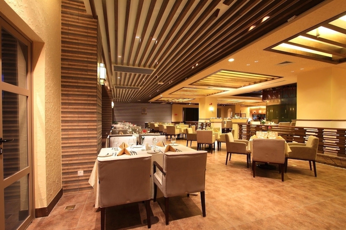 Imagen del bar/restaurante del Hotel Grand Bay View International Dali. Foto 1