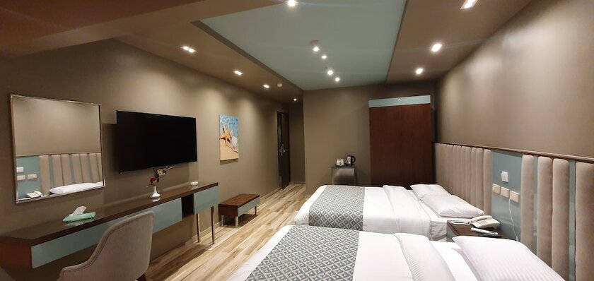 Imagen de la habitación del Hotel Grand Bayan at Nile Plaza. Foto 17