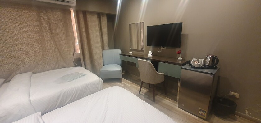 Imagen de la habitación del Hotel Grand Bayan at Nile Plaza. Foto 19