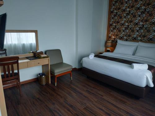 Imagen de la habitación del Hotel Grand Bayu Hill. Foto 14