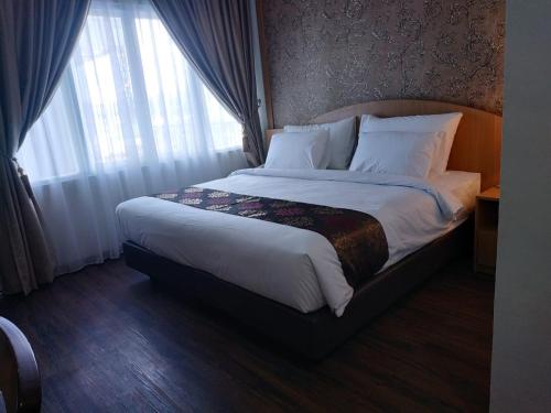 Imagen de la habitación del Hotel Grand Bayu Hill. Foto 15