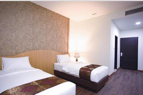 Imagen de la habitación del Hotel Grand Bayu Hill. Foto 18