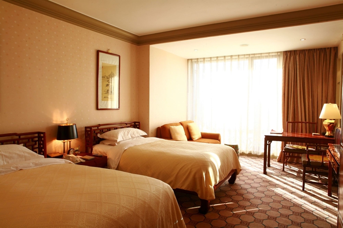 Imagen de la habitación del Hotel Grand Beijing. Foto 5