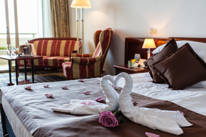 Imagen de la habitación del Hotel Grand Bernardin. Foto 15