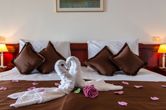 Imagen de la habitación del Hotel Grand Bernardin. Foto 16