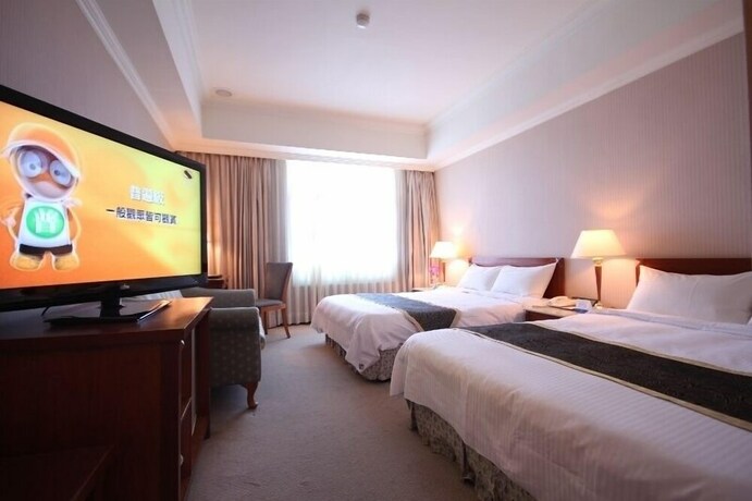 Imagen de la habitación del Hotel Grand Boss. Foto 11