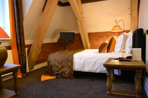 Imagen de la habitación del Hotel Grand Boutique Huis Vermeer. Foto 9