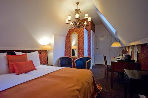 Imagen de la habitación del Hotel Grand Boutique Huis Vermeer. Foto 10