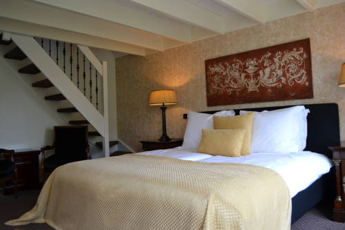 Imagen de la habitación del Hotel Grand Boutique Huis Vermeer. Foto 12