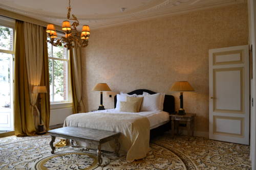 Imagen de la habitación del Hotel Grand Boutique Huis Vermeer. Foto 13