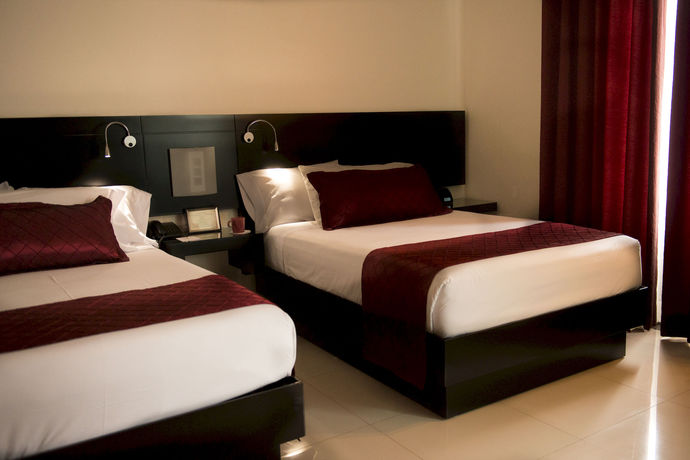 Imagen de la habitación del Hotel Grand , Boutique Tepatitlán. Foto 11