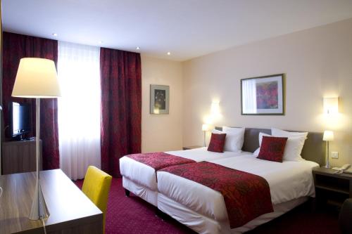 Imagen de la habitación del Hotel Grand Bristol, Colmar. Foto 7