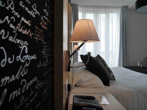 Imagen de la habitación del Hotel Grand Brive. Foto 14