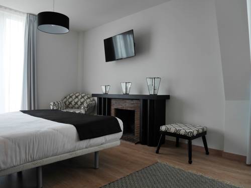 Imagen de la habitación del Hotel Grand Brive. Foto 16