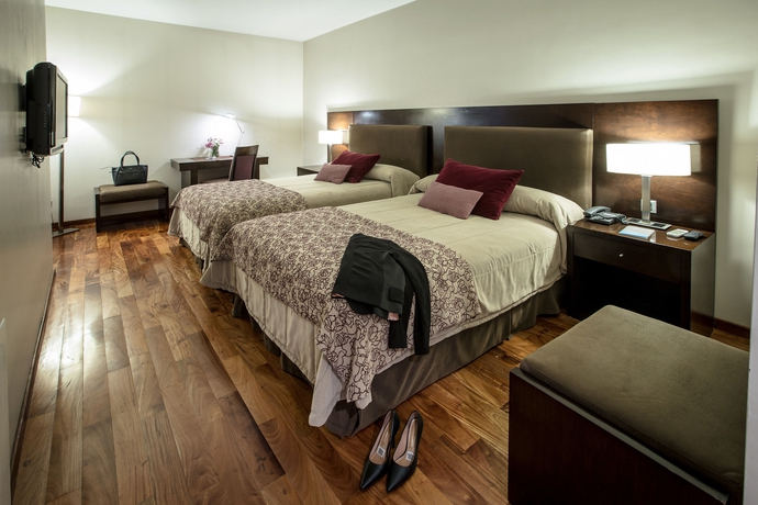 Imagen de la habitación del Hotel Grand Brizo Comahue. Foto 7