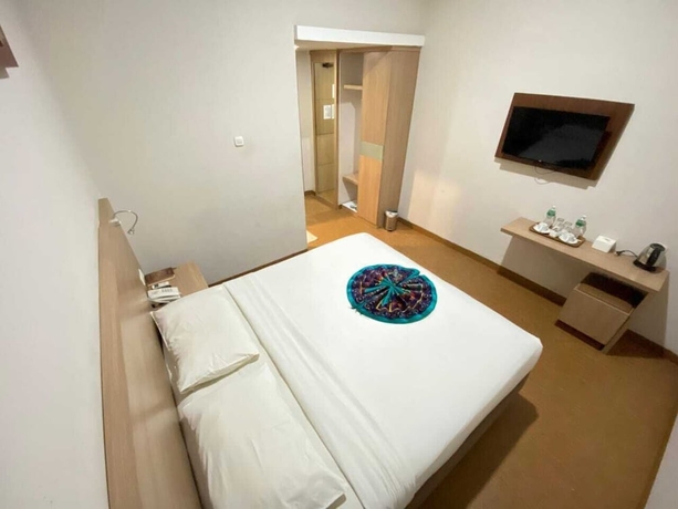 Imagen de la habitación del Hotel Grand Bunda Syariah Bukittinggi Powered By Archipelago. Foto 5