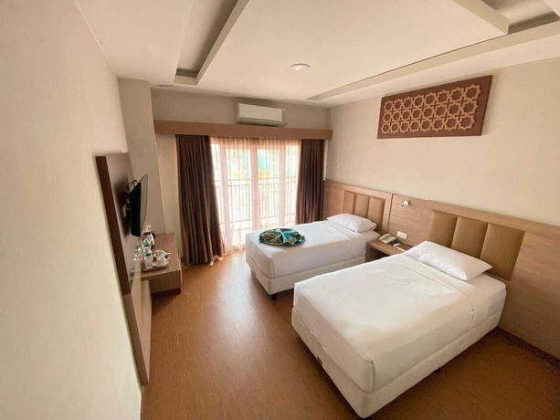 Imagen de la habitación del Hotel Grand Bunda Syariah Bukittinggi Powered By Archipelago. Foto 7