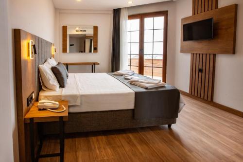 Imagen de la habitación del Hotel Grand Business. Foto 15