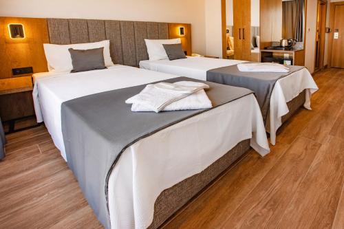 Imagen de la habitación del Hotel Grand Business. Foto 20