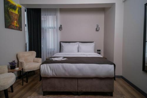 Imagen de la habitación del Hotel Grand CLOVER. Foto 17
