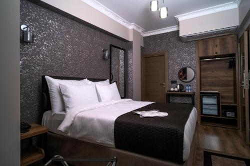 Imagen de la habitación del Hotel Grand CLOVER. Foto 19