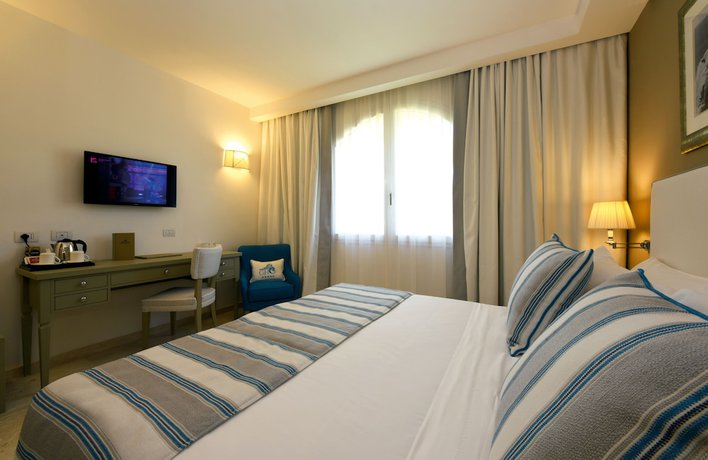 Imagen de la habitación del Hotel Grand Cannigione. Foto 5