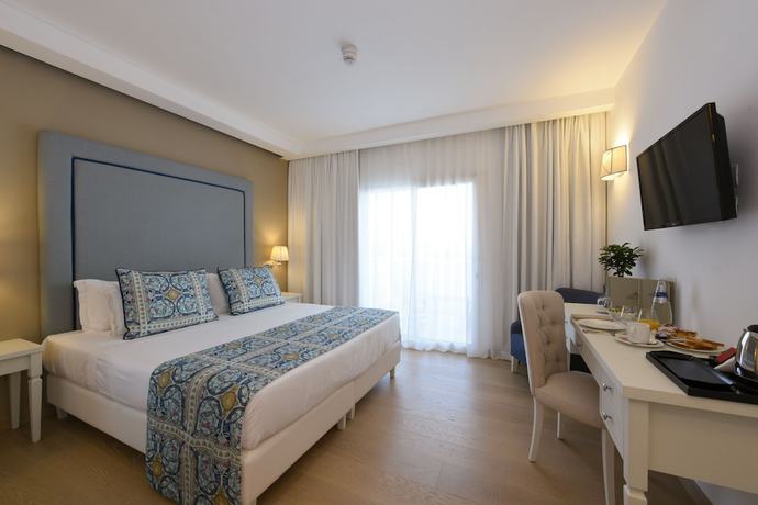 Imagen de la habitación del Hotel Grand Cannigione. Foto 12